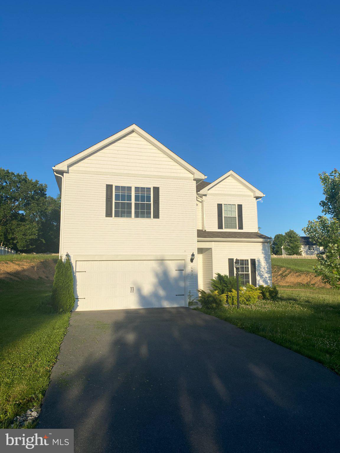 697 Rivanna Run Falling Waters, WV 25419 - Photo 3 of 44 a view of a house with a yard