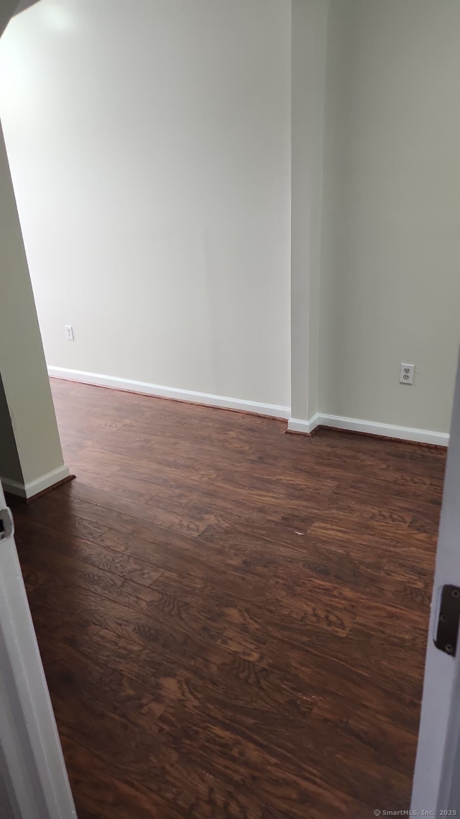 283 Waterview Avenue, Unit B Bridgeport, CT 06608 - Photo 3 of 7 a view of an empty room with wooden floor