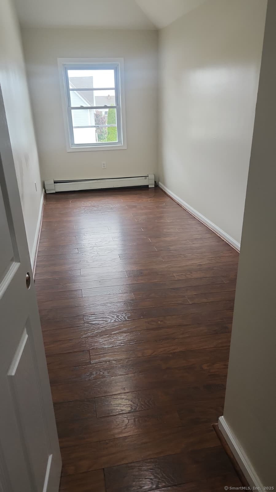 283 Waterview Avenue, Unit B Bridgeport, CT 06608 - Photo 4 of 7 an empty room with windows