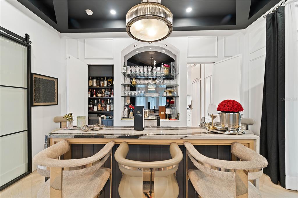 4923 West San Rafael Street Tampa, FL 33629 - Photo 31 of 70 a kitchen with stainless steel appliances granite countertop a sink and a stove