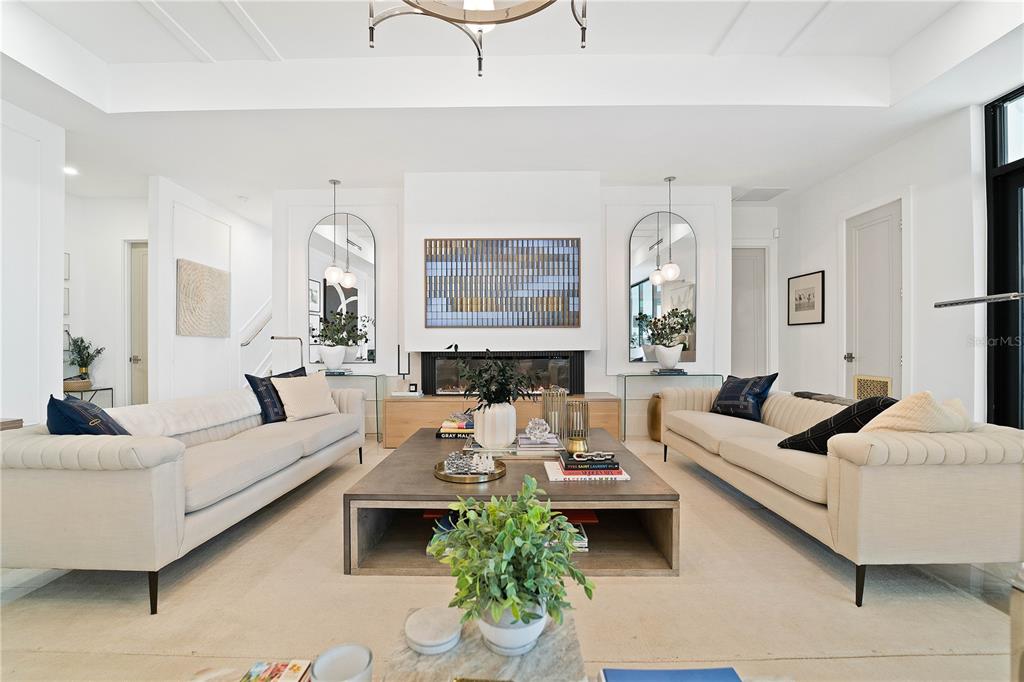 4923 West San Rafael Street Tampa, FL 33629 - Photo 63 of 70 a living room with furniture or couch and a potted plant