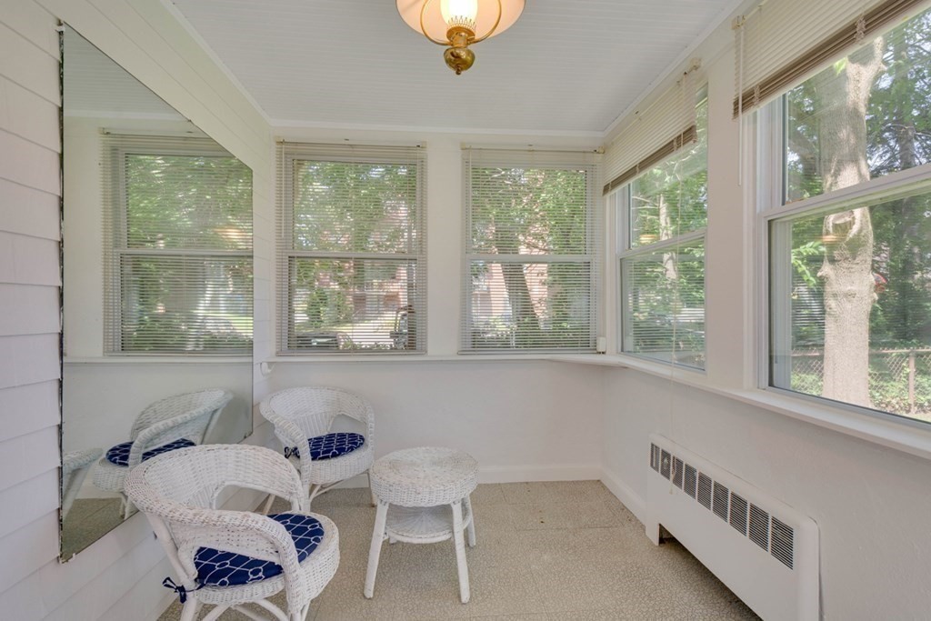 11 Stimson Street Boston, MA 02132 - Photo 15 of 32 a living room with furniture and a window