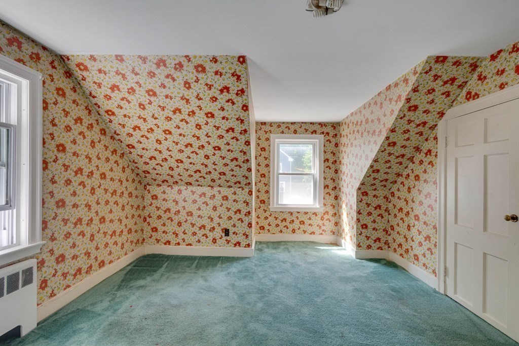 11 Stimson Street Boston, MA 02132 - Photo 20 of 32 a bathroom with a shower curtain