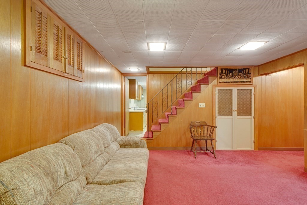 11 Stimson Street Boston, MA 02132 - Photo 25 of 32 a living room with a couch