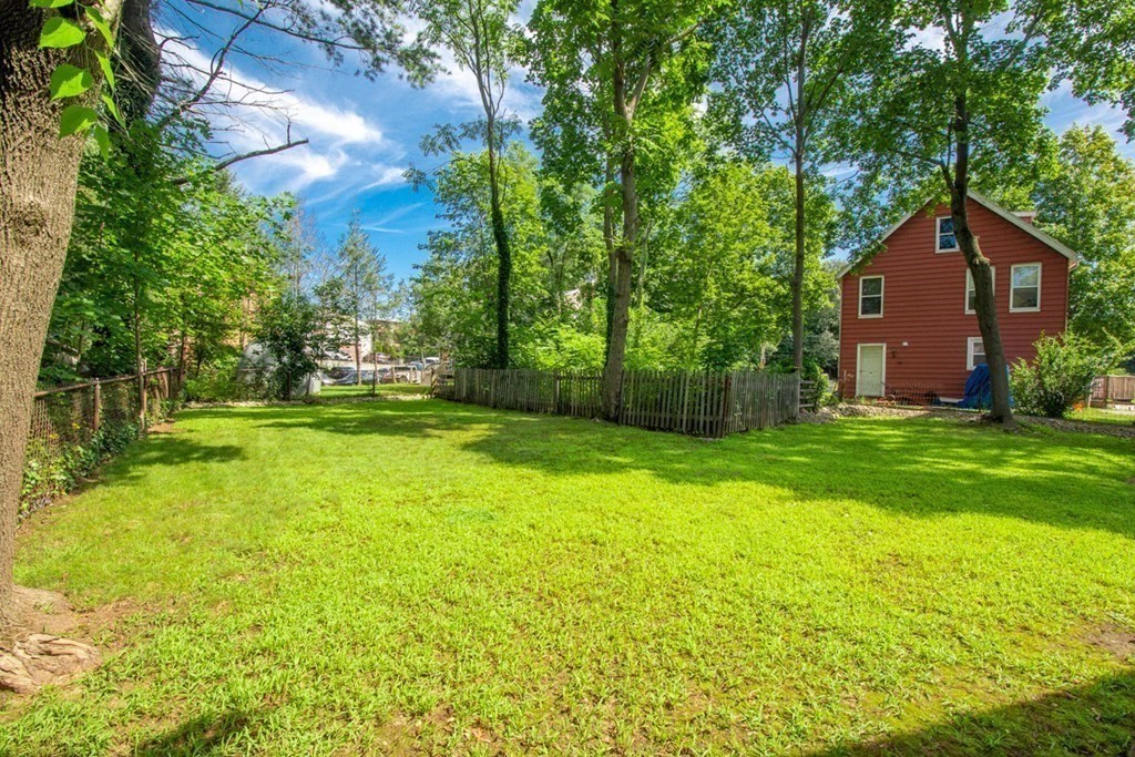 11 Stimson Street Boston, MA 02132 - Photo 29 of 32 a view of a house with backyard