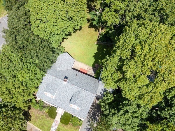 11 Stimson Street Boston, MA 02132 - Photo 4 of 32 an aerial view of a house with a yard and lake view