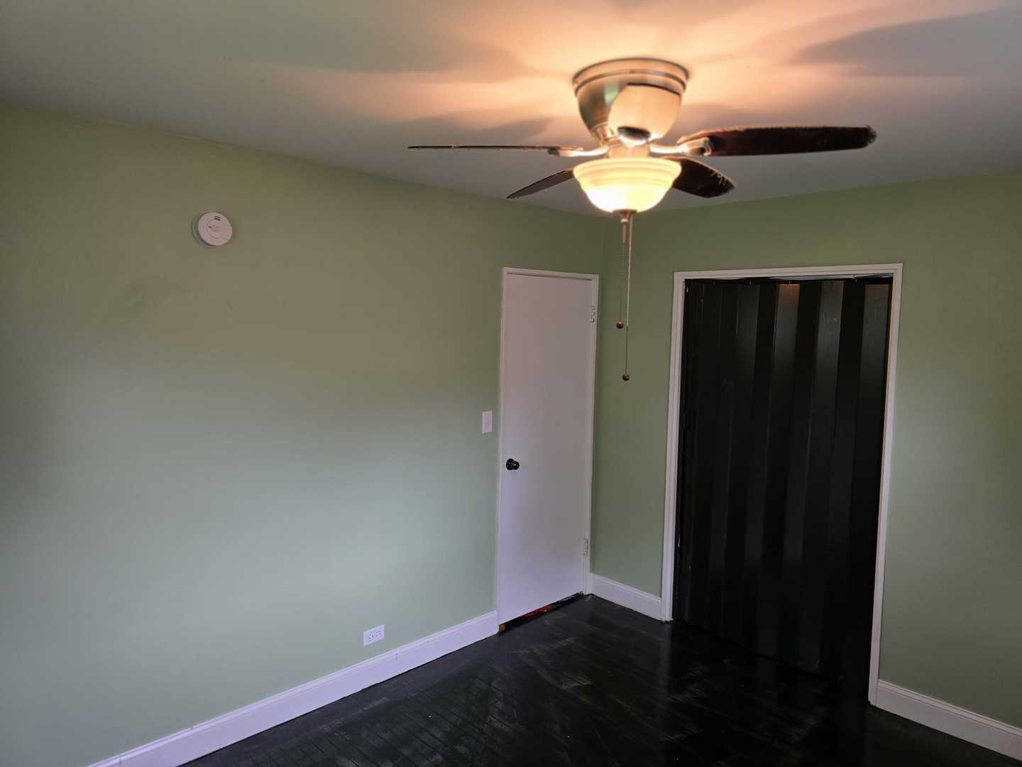 3014 West 163rd Street Markham, IL 60428 - Photo 11 of 18 a view of a chandelier fan and a chandelier fan