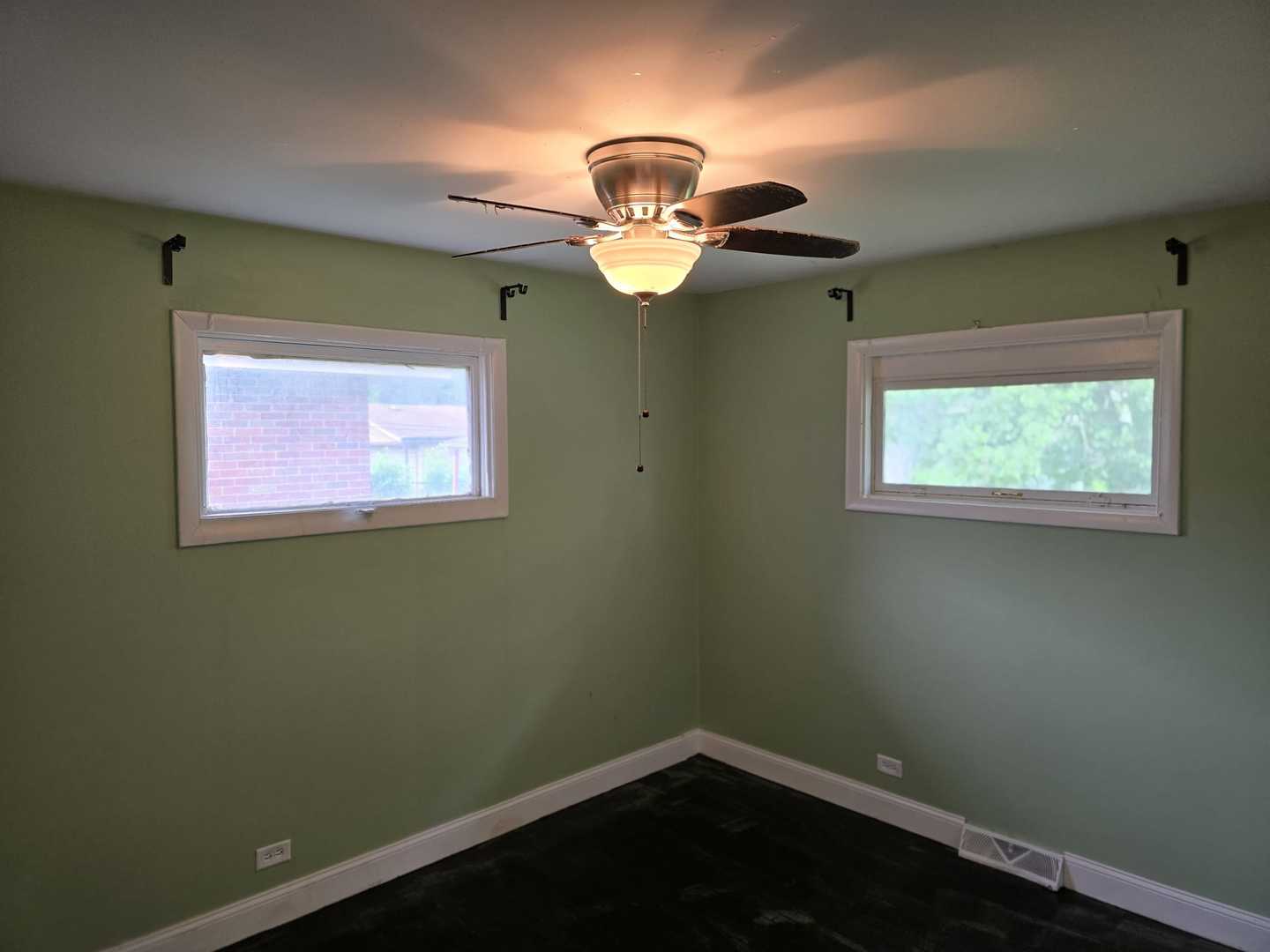 3014 West 163rd Street Markham, IL 60428 - Photo 13 of 18 a view of a small space with wooden floor a window