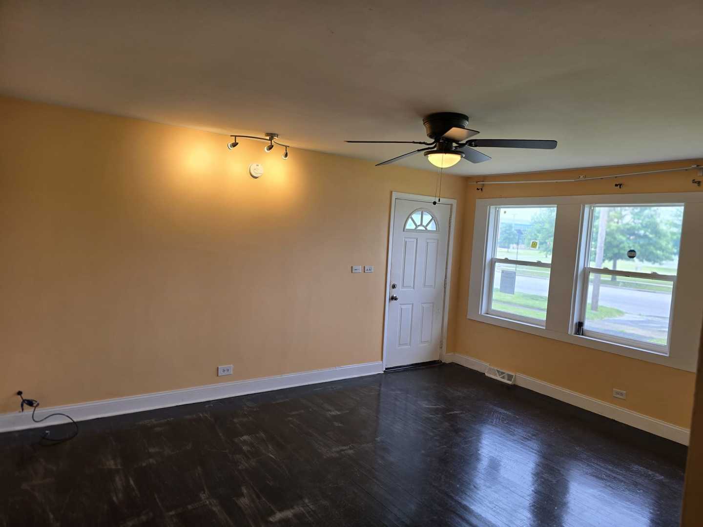 3014 West 163rd Street Markham, IL 60428 - Photo 3 of 18 a view of an empty room with a window