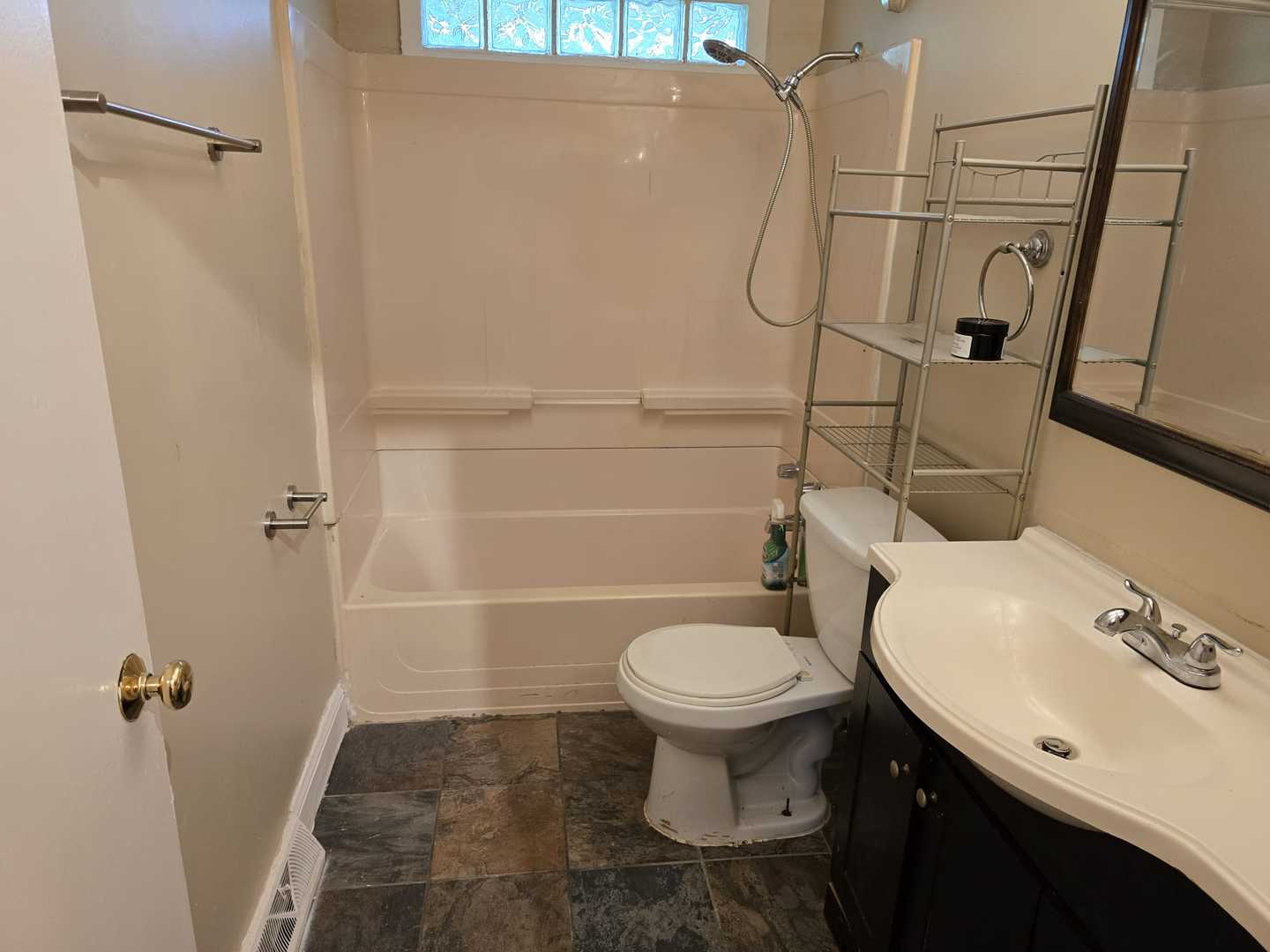 3014 West 163rd Street Markham, IL 60428 - Photo 10 of 18 a bathroom with a sink toilet and shower