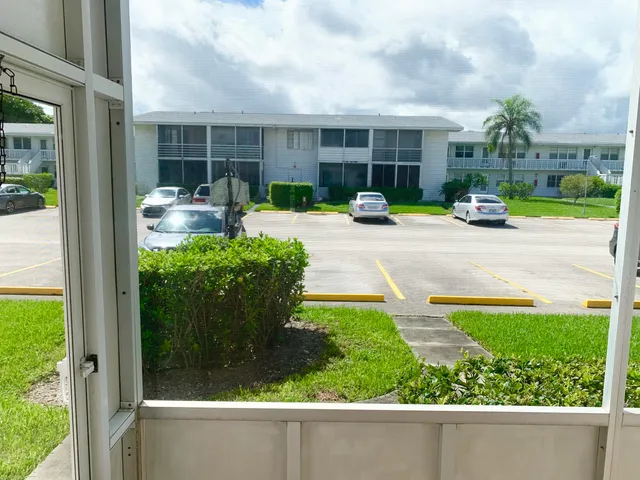 a view of a house with a swimming pool