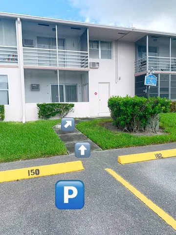 a flower plants in front of a house