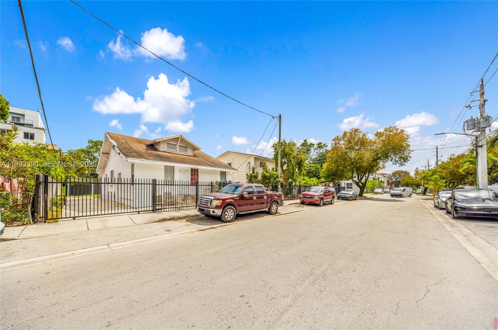 a view of a cars parked in front of a building