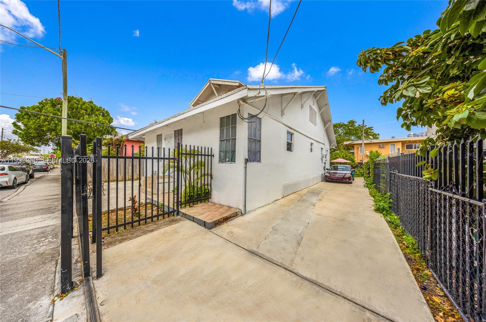 127 Southwest 7th Avenue Miami, FL 33130 - Photo 3 of 6 a view of a house with a iron gate