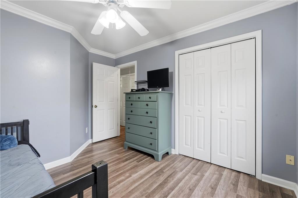 2664 Reston Court Northwest Kennesaw, GA 30144 - Photo 19 of 28 a view of a livingroom with furniture and wooden floor