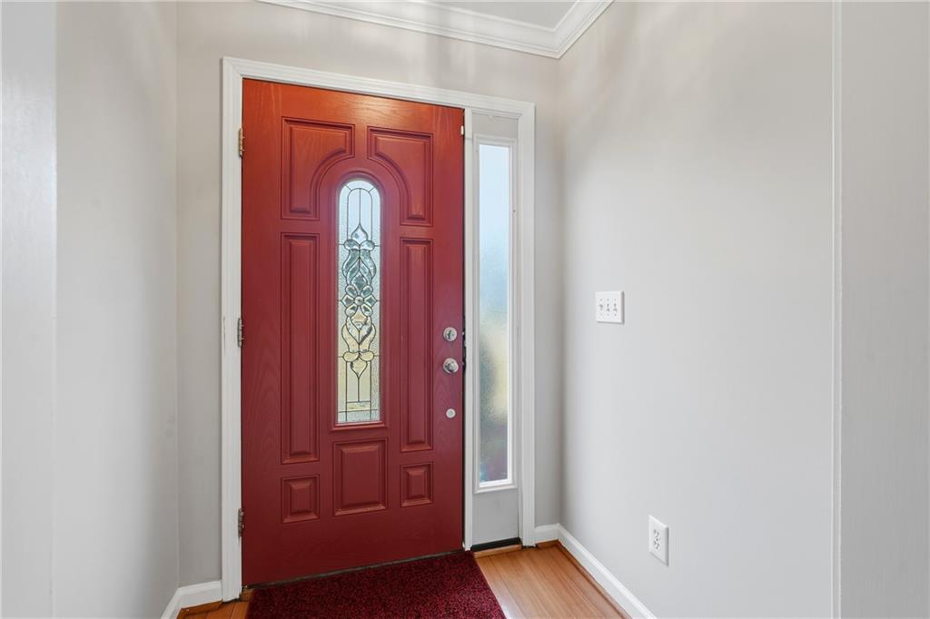 2664 Reston Court Northwest Kennesaw, GA 30144 - Photo 5 of 28 a view of front door with a mirror