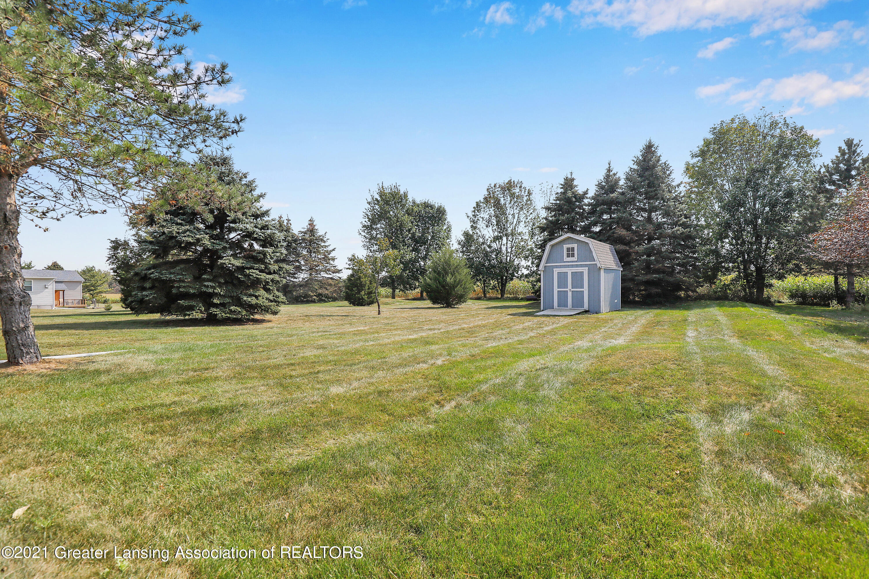 5475 Harper Road Holt, MI 48842 - Photo 29 of 33 Back yard
