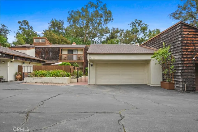 a front view of a house with a garage