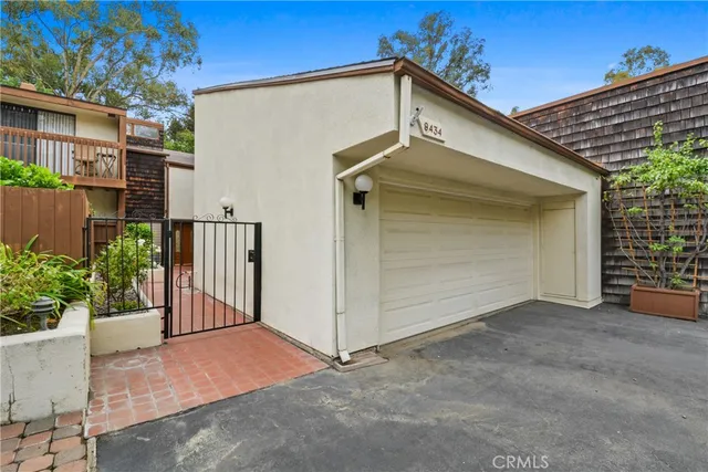 a view of a house with a garage