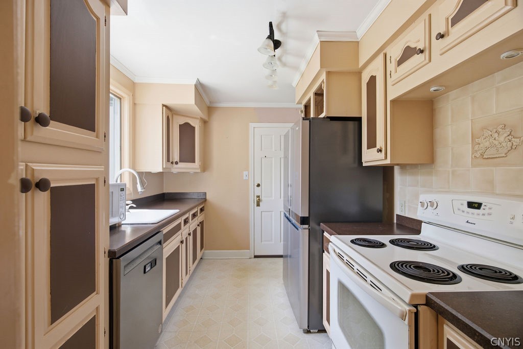 2 Lansdowne Road Syracuse, NY 13214 - Photo 17 of 46 The galley kitchen is located at the back of the h