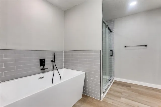a bathroom with a sink and a bathtub