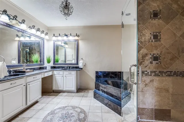 a kitchen with stainless steel appliances a sink stove and cabinets