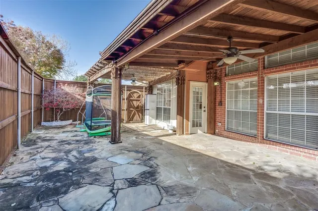 a view of a backyard with a garden