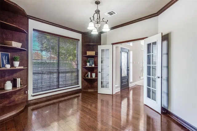 a view of entryway with wooden floor