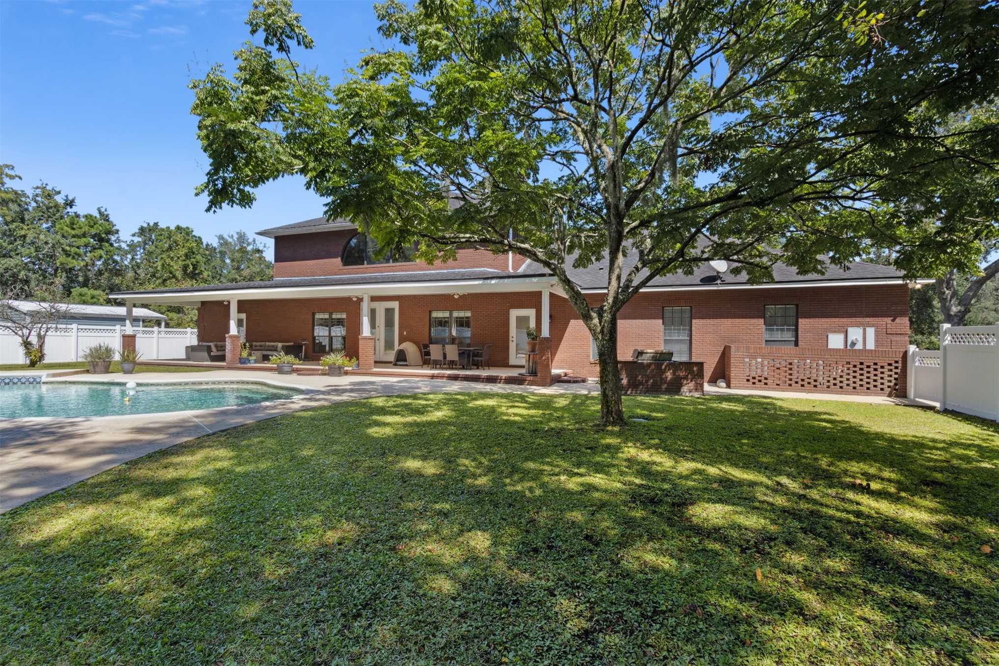 87377 Raddin Road Yulee, FL 32097 - Photo 67 of 75 a view of house with outdoor space and yard