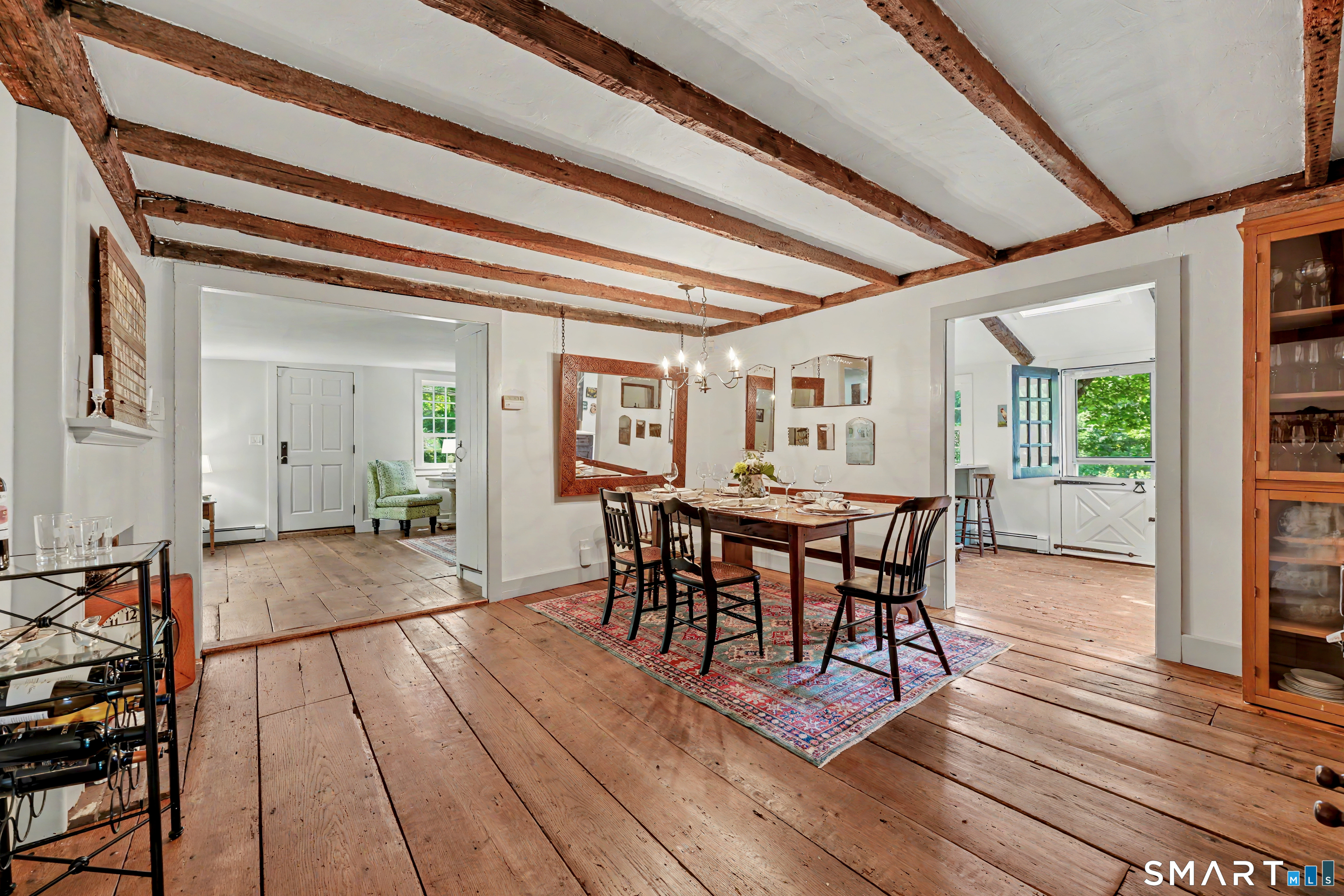 183 Range Road Wilton, CT 06897 - Photo 11 of 40 Dining room opens to both the living room and kitchen