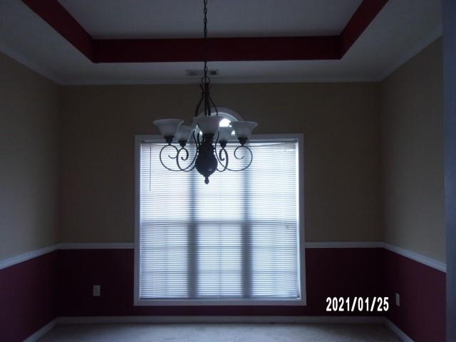 1812 Cumbaa Court Columbus, GA 31907 - Photo 12 of 30 a glass vase sitting on a table near a window