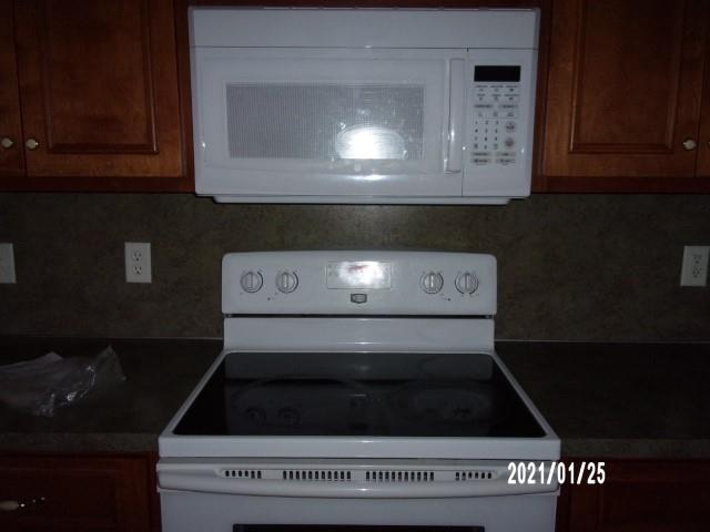1812 Cumbaa Court Columbus, GA 31907 - Photo 14 of 30 a stove top oven sitting inside of a kitchen
