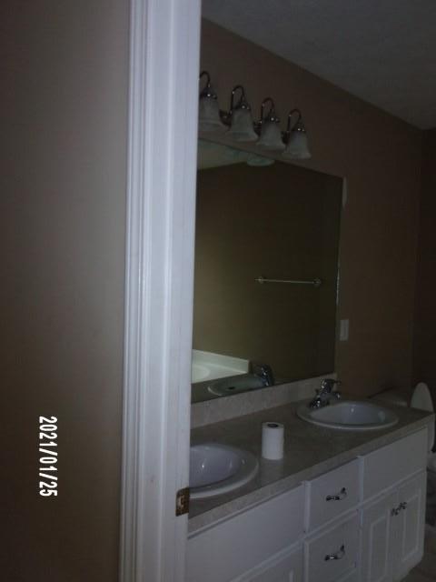 1812 Cumbaa Court Columbus, GA 31907 - Photo 20 of 30 a bathroom with a sink and vanity