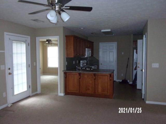 1812 Cumbaa Court Columbus, GA 31907 - Photo 10 of 30 a kitchen with stainless steel appliances granite countertop a refrigerator and a sink