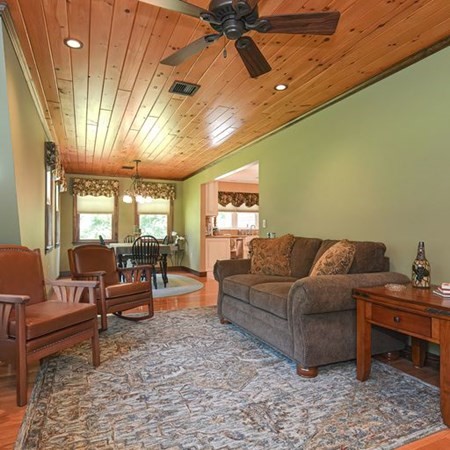 48 Devol Pond Drive Westport, MA 02790 - Photo 17 of 39 a living room with furniture and a large window