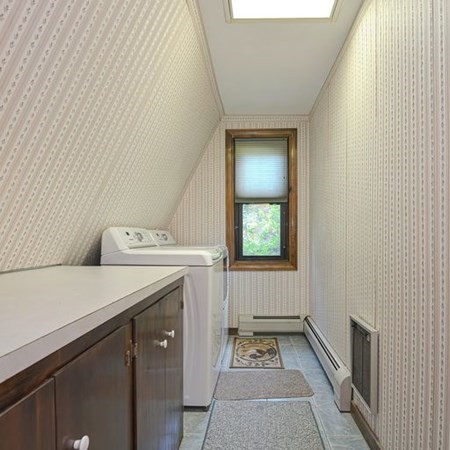 48 Devol Pond Drive Westport, MA 02790 - Photo 23 of 39 a utility room with dryer and washer
