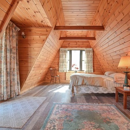 48 Devol Pond Drive Westport, MA 02790 - Photo 24 of 39 a bedroom with a bed and a large window