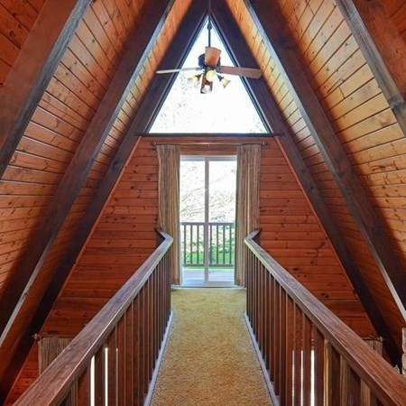 48 Devol Pond Drive Westport, MA 02790 - Photo 26 of 39 a view of balcony with wooden floor