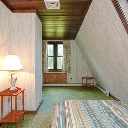 48 Devol Pond Drive Westport, MA 02790 - Photo 29 of 39 a view of a porch with wooden floor and a yard