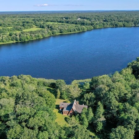 48 Devol Pond Drive Westport, MA 02790 - Photo 3 of 39 an aerial view of a house with a yard