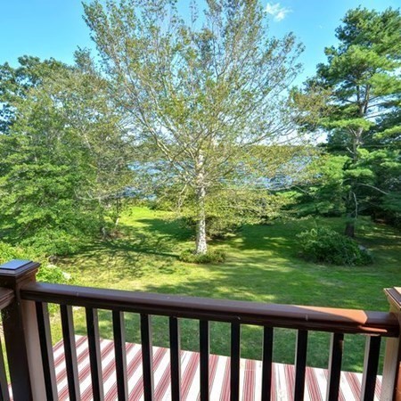 48 Devol Pond Drive Westport, MA 02790 - Photo 31 of 39 a balcony with an outdoor space