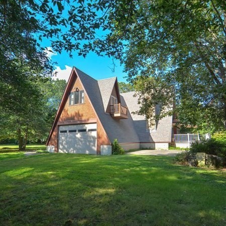 48 Devol Pond Drive Westport, MA 02790 - Photo 33 of 39 a view of a house with a yard