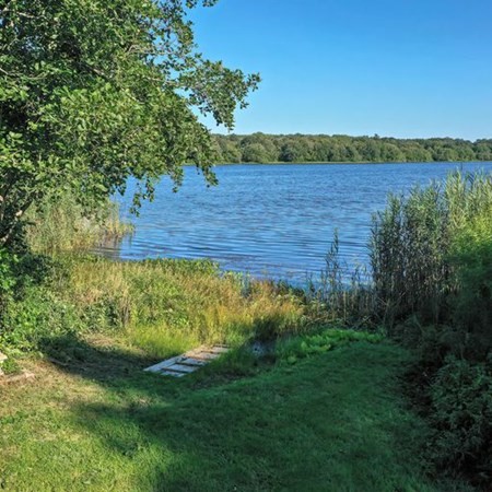 48 Devol Pond Drive Westport, MA 02790 - Photo 5 of 39 a view of an outdoor space and a yard
