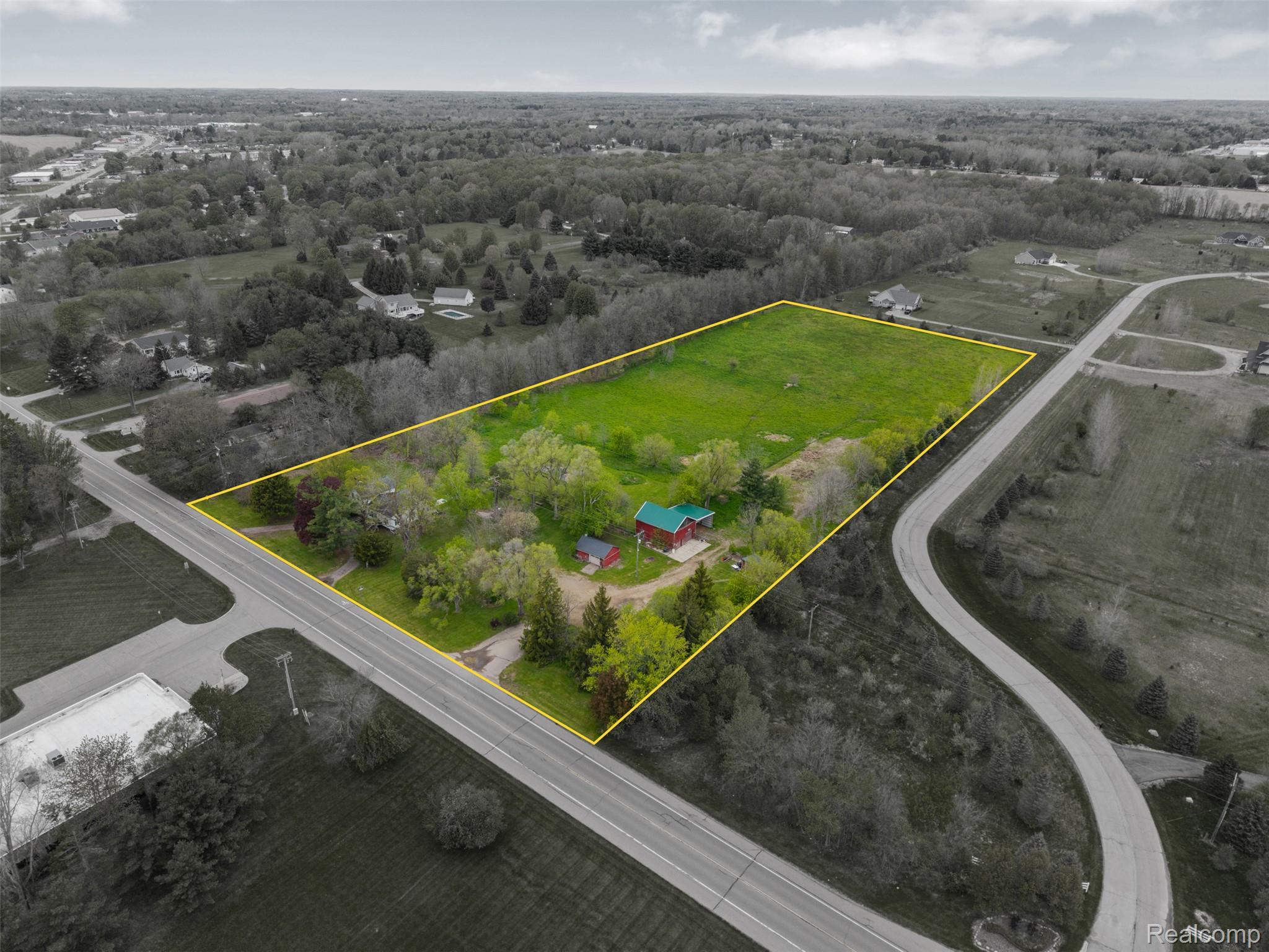 1775 Imlay City Road Lapeer, MI 48446 - Photo 47 of 60 Overview of rural landscape with property boundaries highlighted and a heavily wooded area