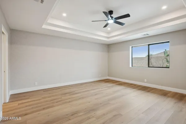 a bathroom with a double vanity sink mirror and toilet