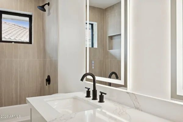 a view of an empty room with a fireplace