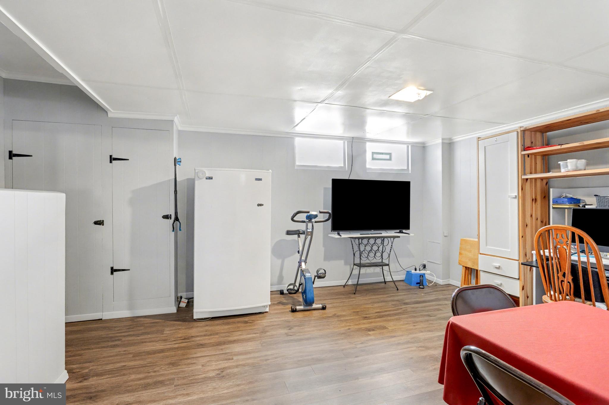 8446 Loch Raven Boulevard Baltimore, MD 21286 - Photo 19 of 30 a living room with furniture and a flat screen tv