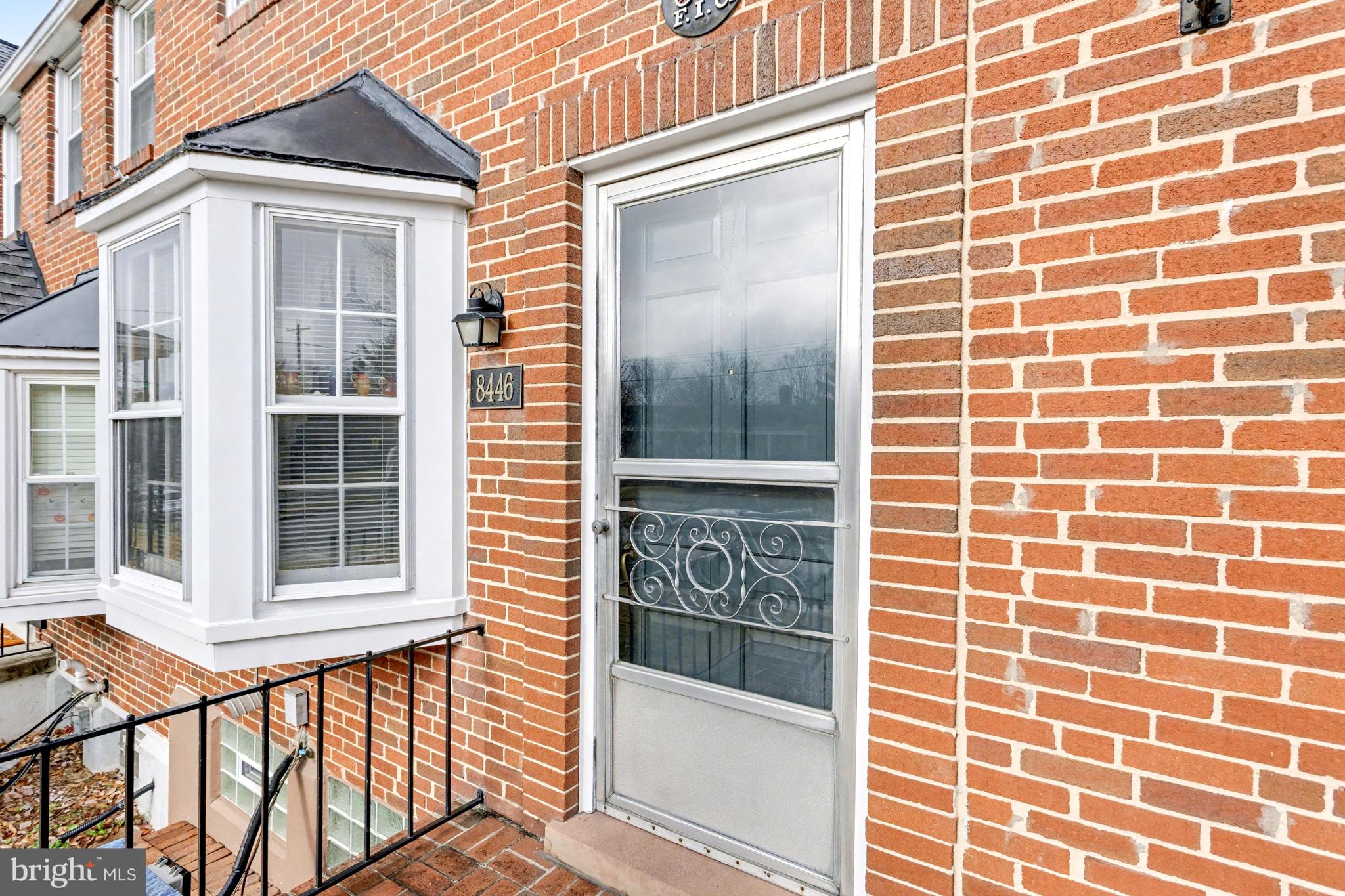 8446 Loch Raven Boulevard Baltimore, MD 21286 - Photo 3 of 30 a view of a door with a window