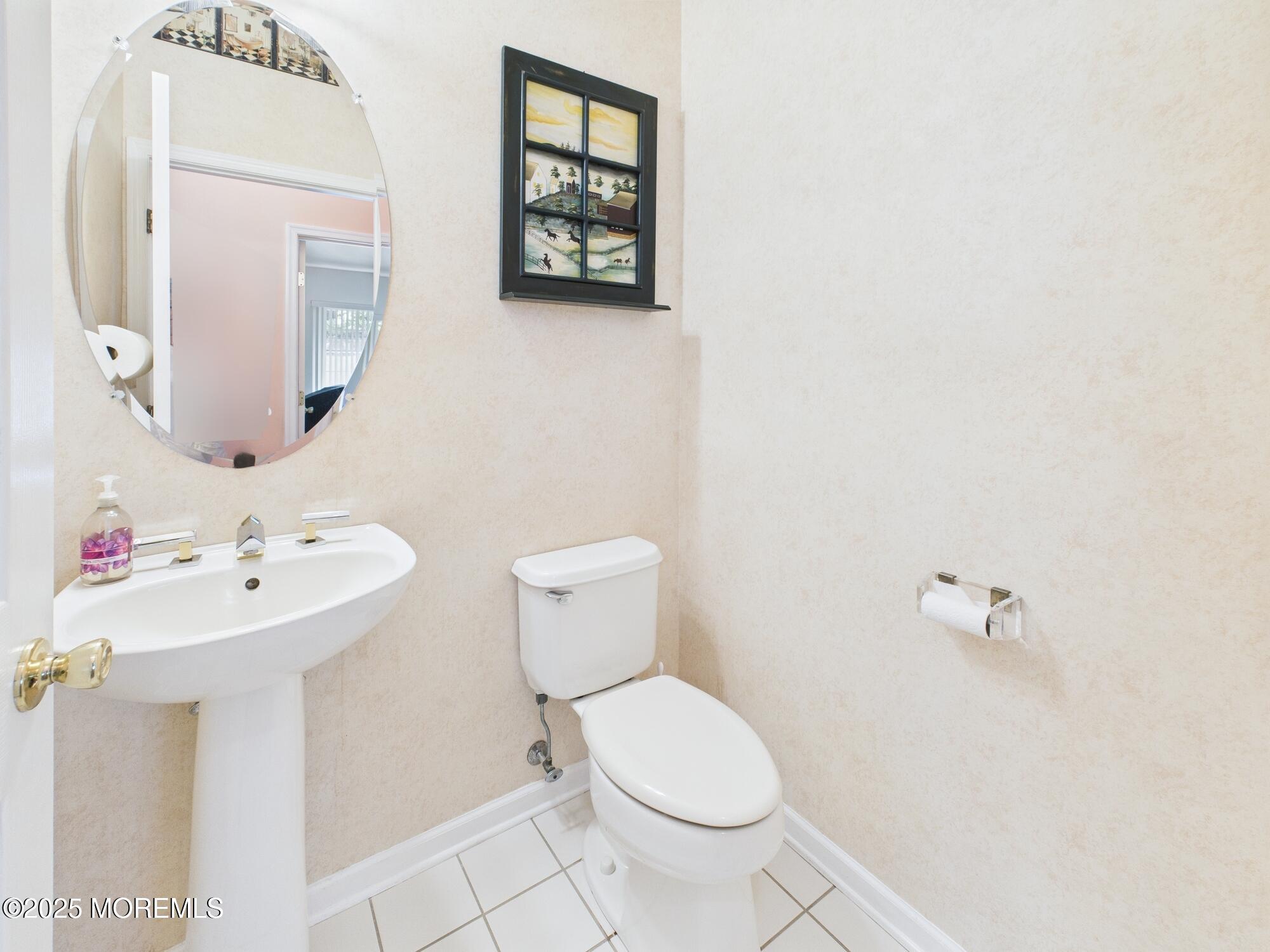 10 Windward Way Red Bank, NJ 07701 - Photo 15 of 31 a bathroom with a toilet sink and mirror