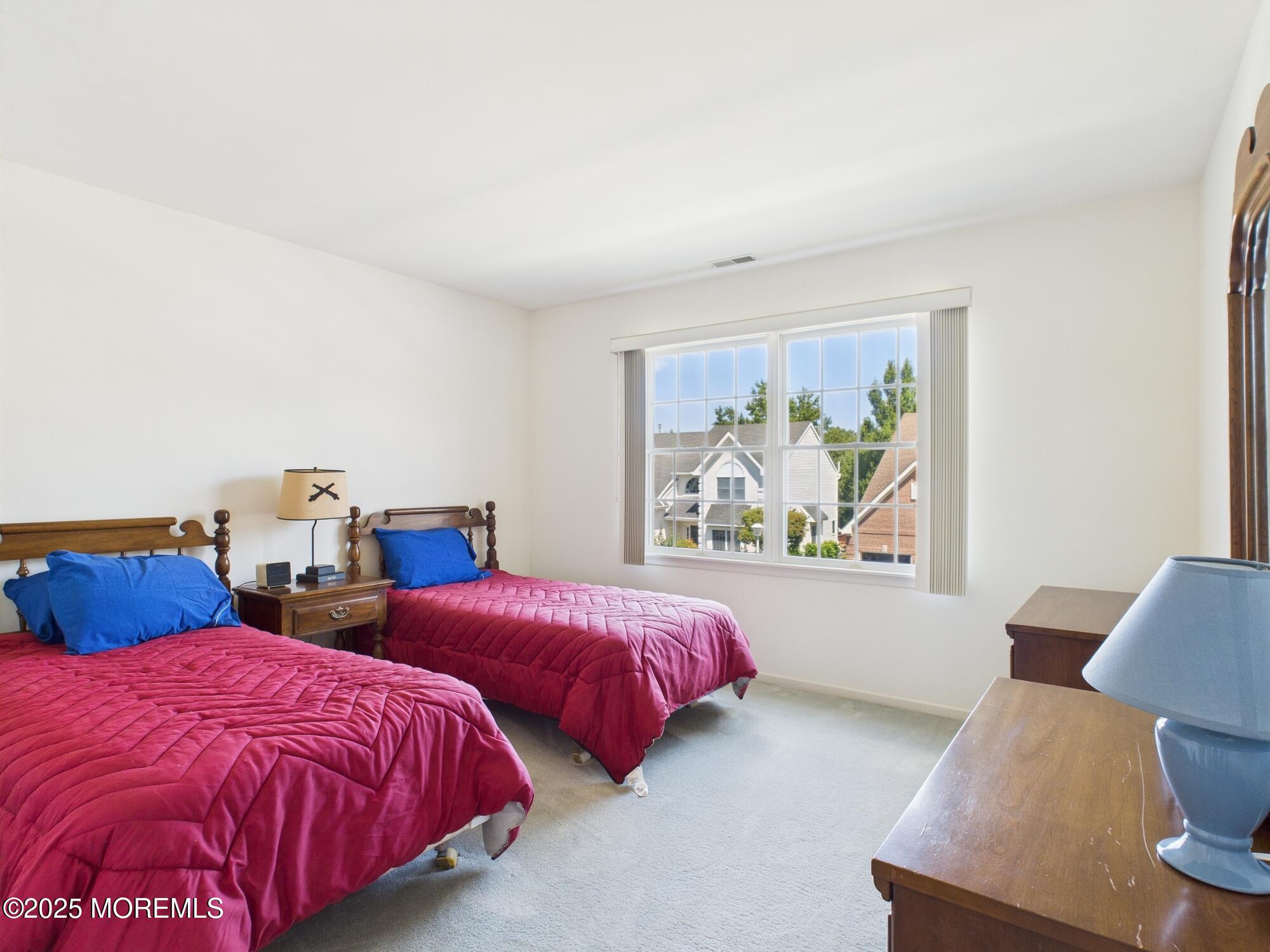 10 Windward Way Red Bank, NJ 07701 - Photo 21 of 31 a bedroom with two beds and a large window
